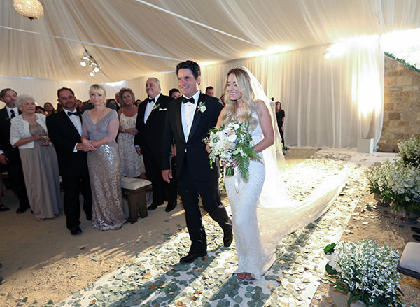 Lauren Conrad's dad walking her down the aisle.