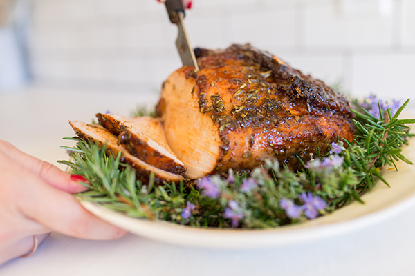 Turkey in a bed of flowering rosemary.