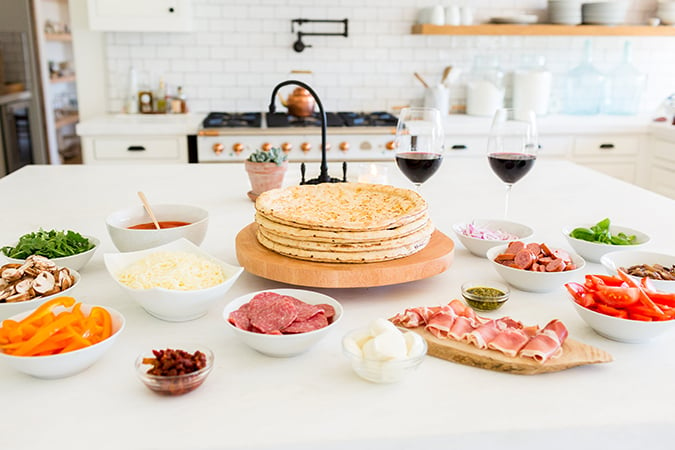 Get tips and tricks on how to throw the perfect pizza party from Lauren Conrad