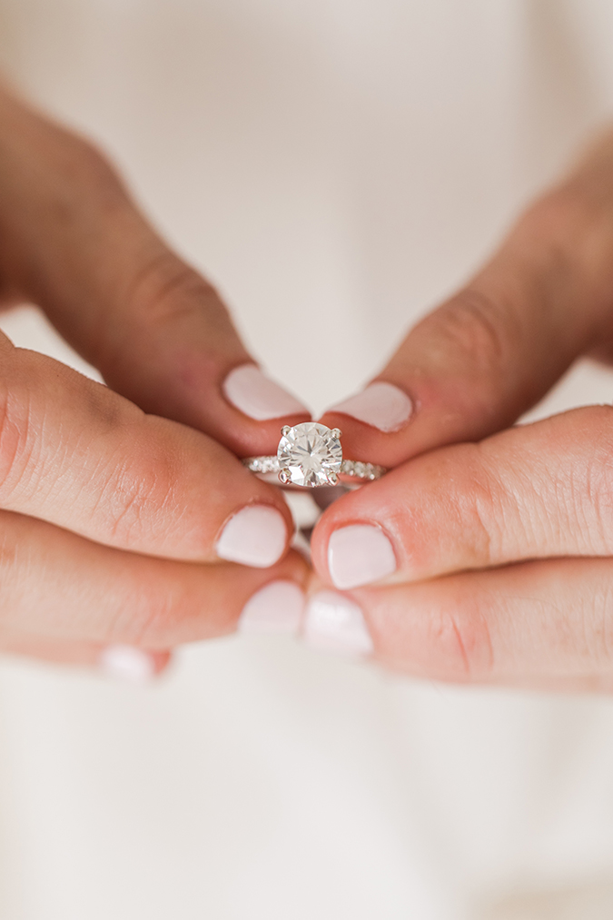 A sweet pink mani and engagement ring