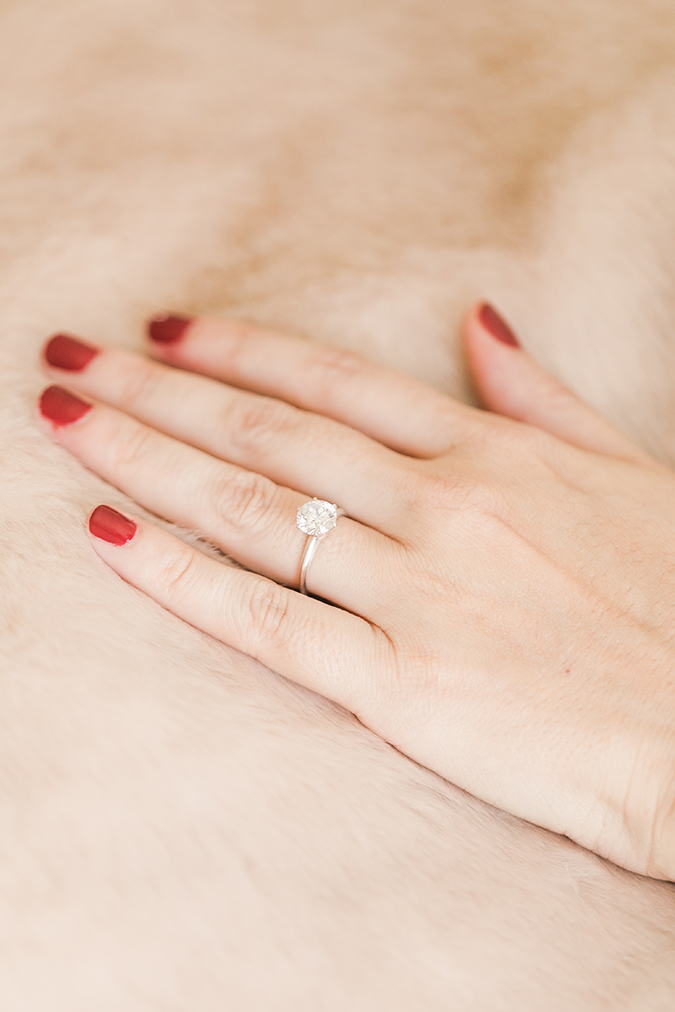 Solitaire engagement ring + holiday red mani