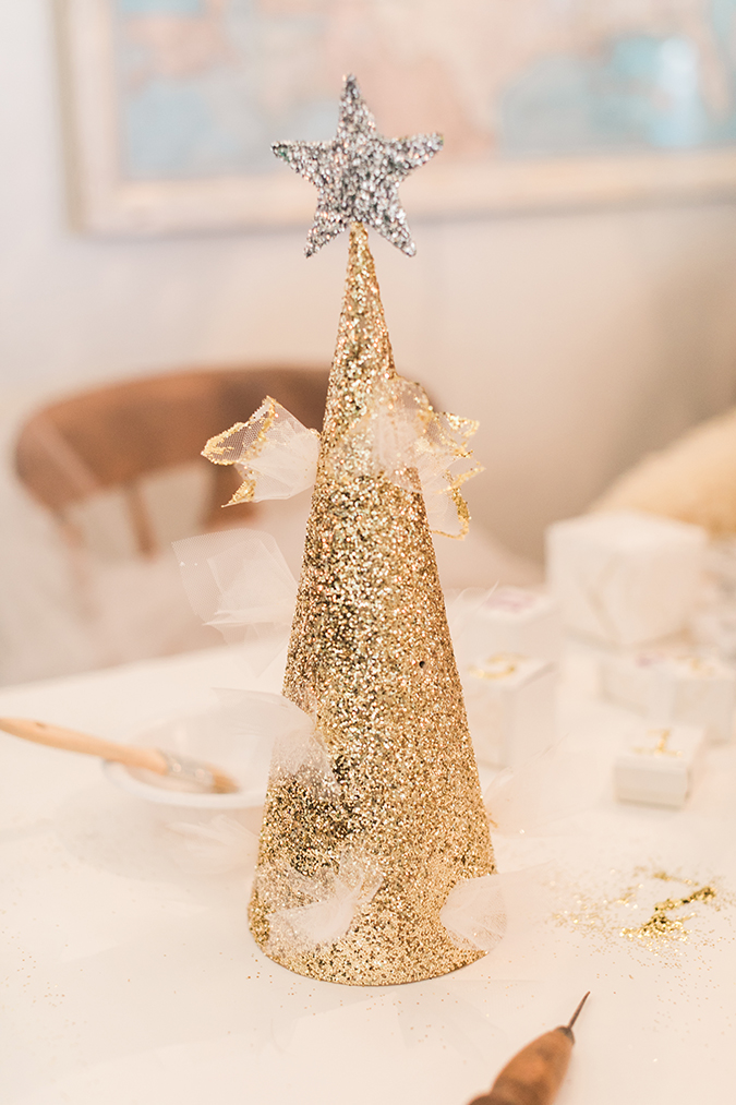 the cutest glittery tree topper for your tree this christmas