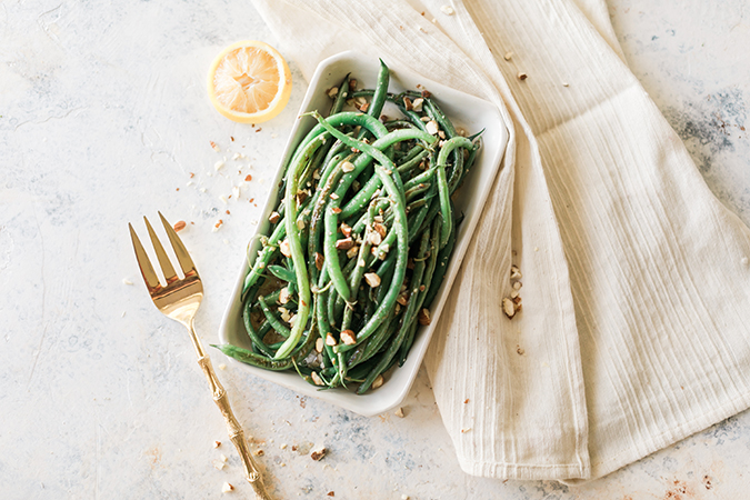 butter-blistered green beans with lemon, almonds and basil