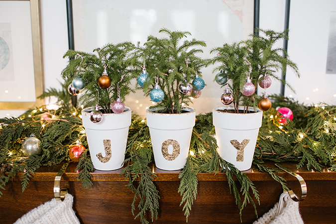 DIY gold leaf pots with mini Christmas trees