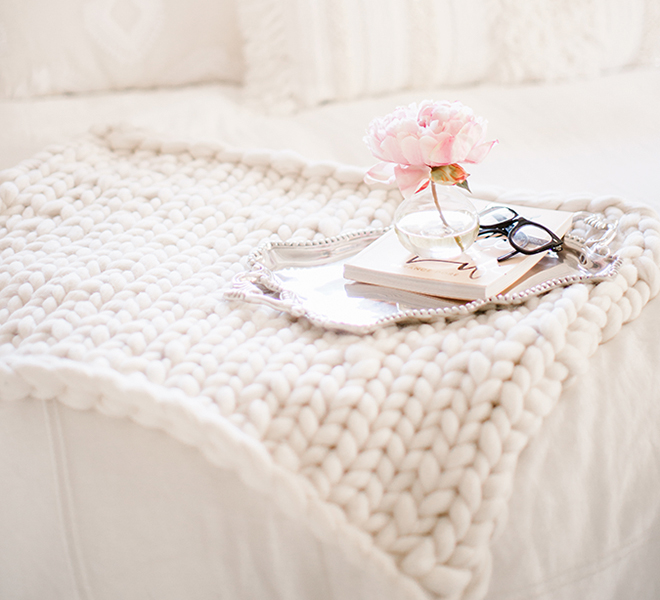 Pink knitted bed online throw