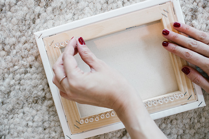 how to DIY a woven wall hanging