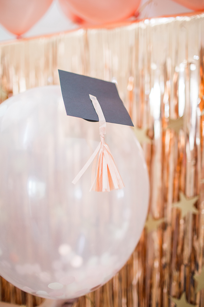 how to make a graduation balloon backdrop via laurenconrad.com